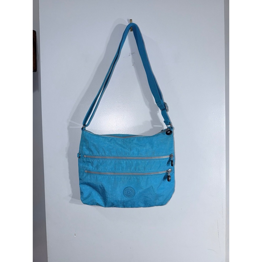 Kipling Alvar blue crossbody bag with multiple zippered pockets